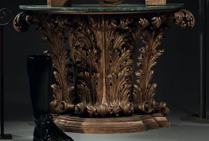 Gilded and carved wood console decorated...
