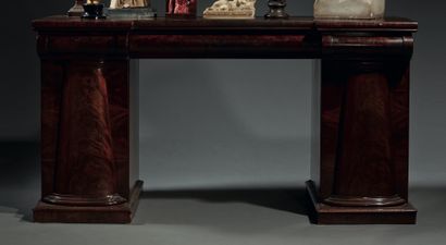 null Mahogany and mahogany veneer pedestal desk opening with three drawers in the...