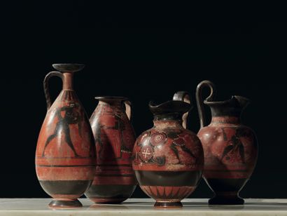 Four vases with black figures on a red background...