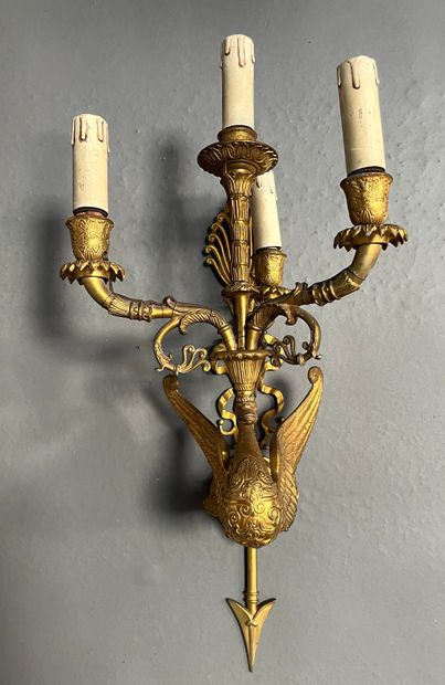 Bronze wall lamp decorated with a swan supporting...