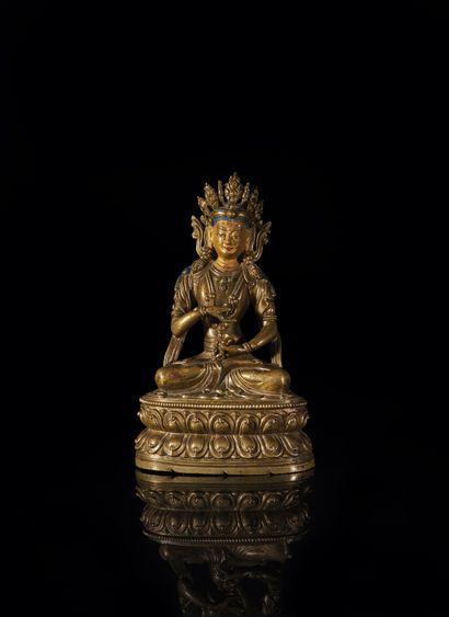 TRAVAIL SINO-TIBETAIN - XVIIIe siècle Brass statuette of Vajradhara, face gold lacquered,...
