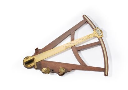 null Mahogany and brass pinnacle octant, blade and vernier divided on bone
England,...