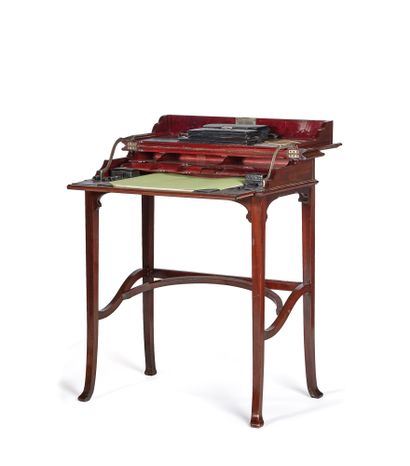 null Mahogany system desk, the opening of the cover reveals the writing desk, with...