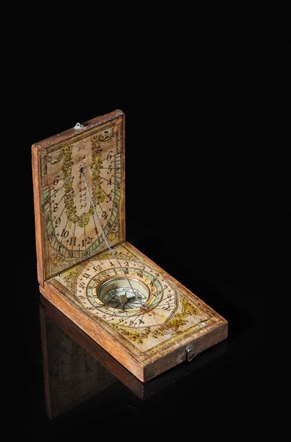 null Dyptic sundial in wood and polychrome engraved papers, said Nuremberg
Germany,...