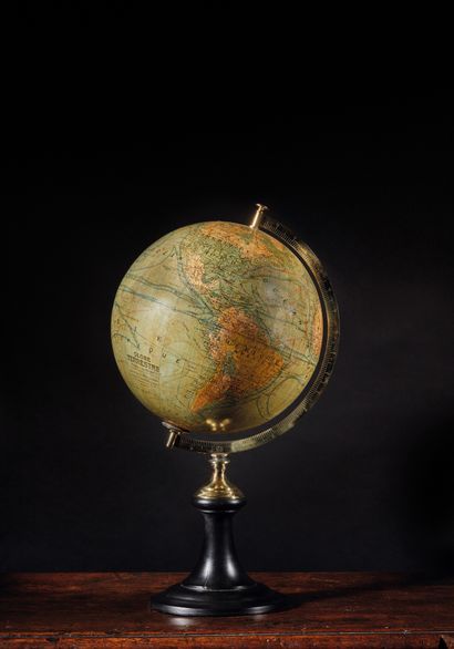 null Graduated brass half-meridian globe on a blackened wooden base, signed J.Forest...