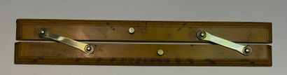 null Parallel rulers in blond wood joined by 2 brass crosspieces
England, 20th century
L....