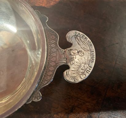 null Silver wine cup with handle decorated with an engraved scene captioned "JATENS...
