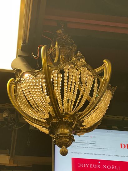 null An ormolu basket chandelier with foliage decoration on four arms alternating...