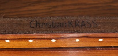 Christian KRASS (1868-1957) Table basse en placage d'ébène de Macassar et frise de...