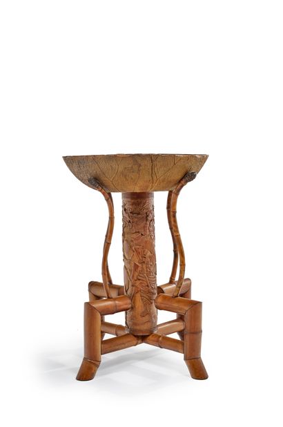 MAISON DES BAMBOUS Bamboo pedestal table with a carved basin decorated with water...