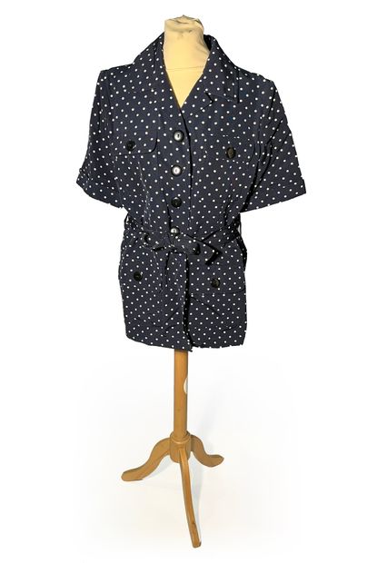 null Yves Saint-laurent variations. Cotton blouse with white polka dots on a black...