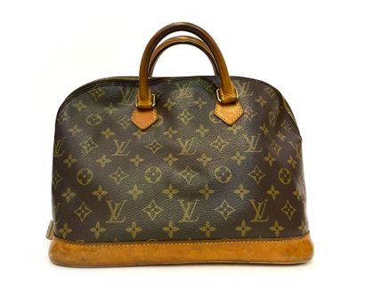 null Louis Vuitton. Monogrammed leather bag 29x33x15cm (stains and wear)