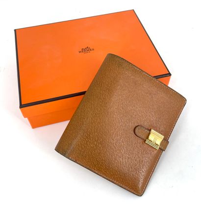 Hermès - Brown leather wallet with gold metal...