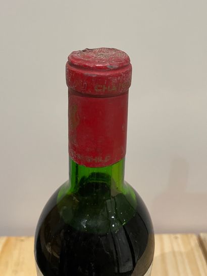 null 1 bottle CHATEAU MOUTON ROTSCHILD 1973. GCC1 Pauillac 

(damaged cap, damaged...