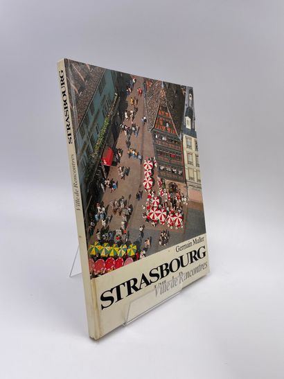 null 2 Volumes : 

- "Strasbourg, Ville de Rencontres", Germain Muller, Ed. Éditions...