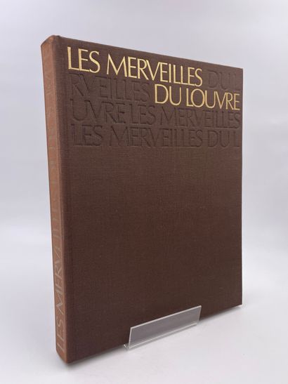 null 2 Volumes : 

- "LES MERVEILLES DU LOUVRE, Préface d'André Parrot, Ed. Réalités...