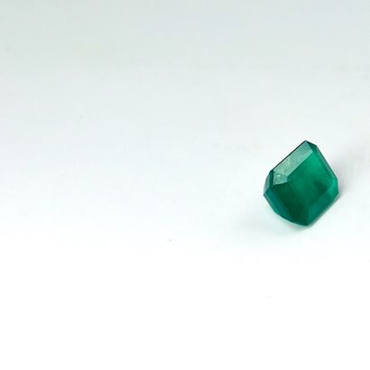 null Rectangular emerald with cut sides weighing 5.13 cts.Accompanied by a GIA certificate...