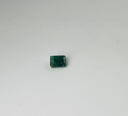 null Emerald (root) rectangular cut weighing 5.56 cts Accompanied by a GJSPC cer...