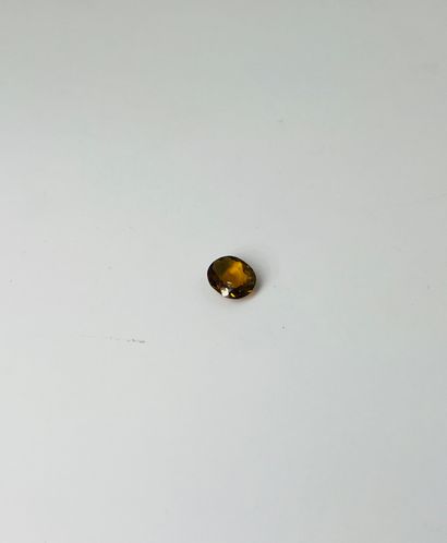 null Oval yellow tourmaline weighing 1.29 ct