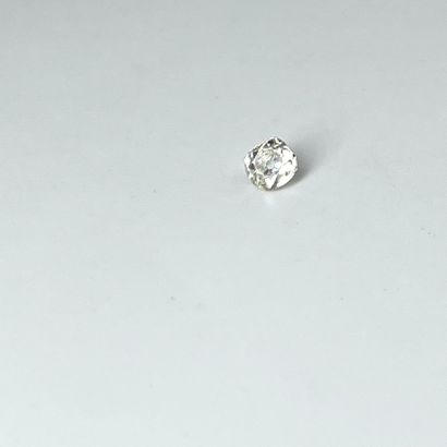 null Antique cut diamond on paper weighing approx. 0.40 ct.