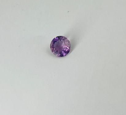 null Round amethyst weighing 4.46 cts. Accompanied by a certificate IDT