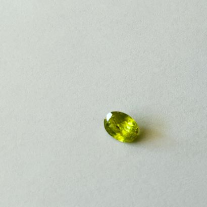 null Sphene " change color " oval faceted weighing 1.19 cts probably from BURMA (Myanmar)...