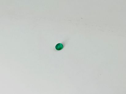 null Oval faceted emerald probably from Colombia weighing 0.32 ct.Dimensions: 0.5...