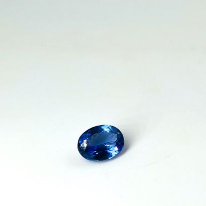 null Oval Tanzanite weighing 7.05 cts. Accompanied by an AIG certificate.