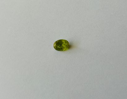 null Sphene " change color " oval faceted weighing 1.19 cts probably from BURMA (Myanmar)...