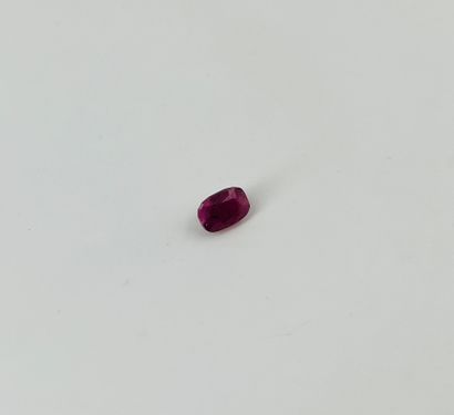 null Rectangular cushion cut ruby weighing 3.55 cts. With its GTL certificate.