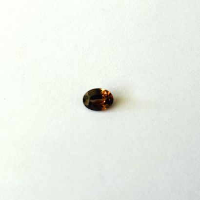 null Brown oval zircon weighing 2.01 cts - Probable provenance CAMBODIA - Unheated...