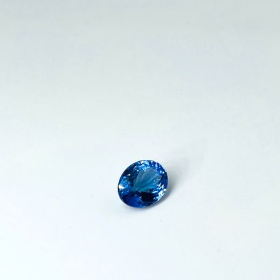 null Tanzanite oval size weighing 3.14 cts Accompanied by a certificate AIG attesting...