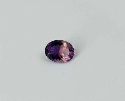 null Faceted oval ametrine weighing 11.3 cts probably from Brazil Dimensions: 1.8...