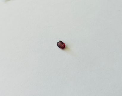null Oval faceted red/brown spinel weighing 1.04 cts - Probable provenance BIRMANIA...