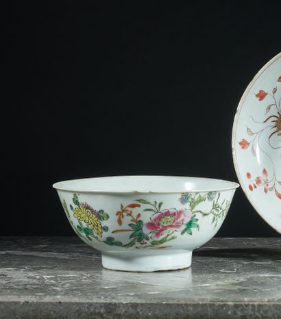 null Porcelain bowl decorated with polychrome enamels of the pink family of branches...