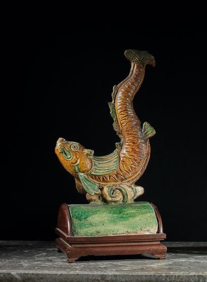 null Green and yellow glazed stoneware ridge tile in the shape of a fish (restoration...