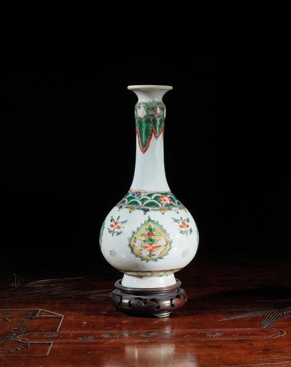 null Vase of bottle form in polychrome enamelled porcelain of the green family with...