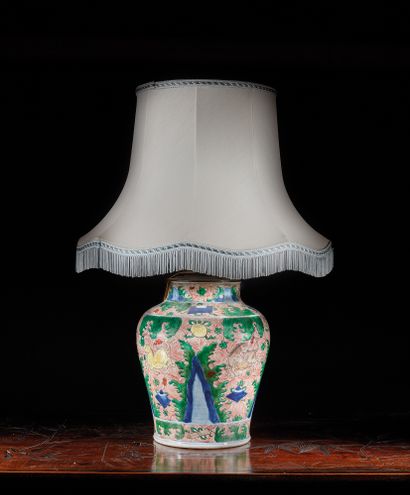 null Porcelain baluster vase decorated in blue underglaze and polychrome enamels...