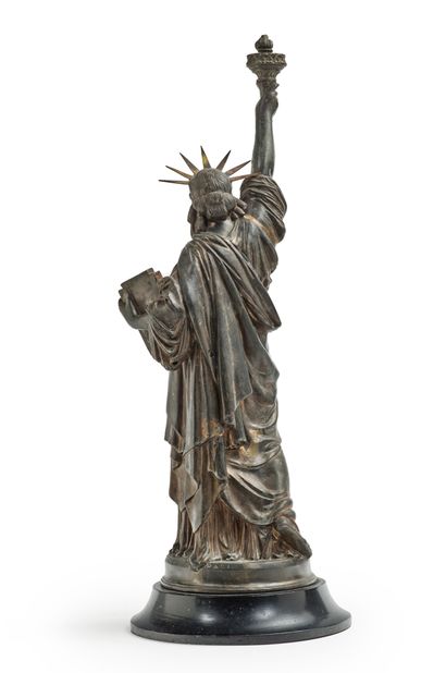 Fréderic-Auguste BARTHOLDI (1834-1904) Statue de la Liberté
Sculpture en zinc
Signée...