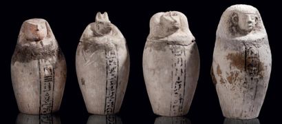 EGYPTE Exceptionnel ensemble de quatre Vases Canopes, provenant du même mobilier...