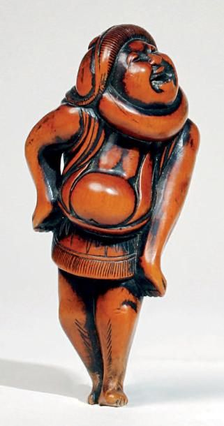JAPON - Epoque EDO (1603 - 1868) Netsuke en bois, lutteur de sumo debout. Non signé....