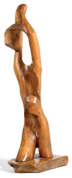 Le GUYADER, XXème siècle Nu féminin. Sculpture en bois H. 125 cm