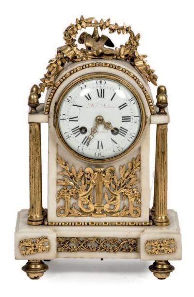 null White marble and gilt bronze clock. The enamelled dial signed D. F. Dubois is...