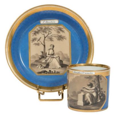VIENNE Blue and gold porcelain cup and saucer with grisaille decoration of female...