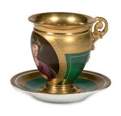 PARIS Ovoid cup and saucer in green and gold porcelain with polychrome decoration...