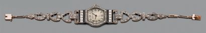 null Bracelet-montre de dame Art Déco, en platine et or 18k, à décor géométrique,...