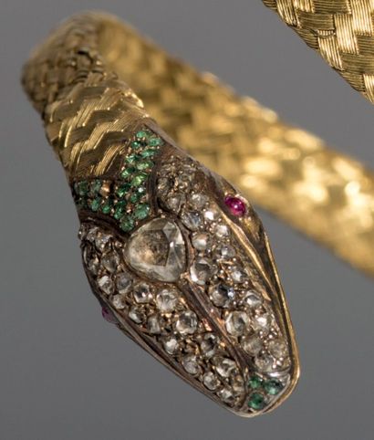 null Bracelet "serpent" en or jaune 18K (750°/00), la tête de forme losangique sertie...