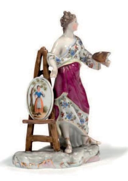 null Sujet en porcelaine polychrome et or
Représentant une femme peintre tenant une...