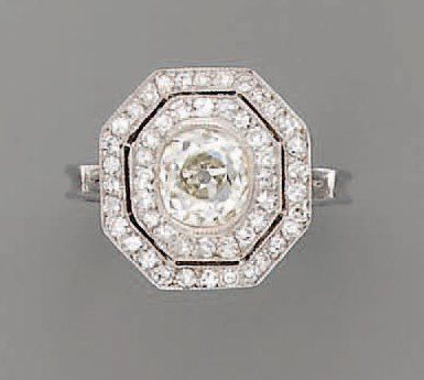 null BAGUE diamant (1,50 cts) double entourage diamants, en or