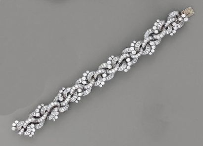 null BRACELET ruban, en platine, diamants brillantés et baguettes - BOUCHERON